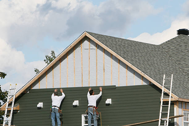 Professional Emergency Siding Repair technician working in Sharpsville, PA